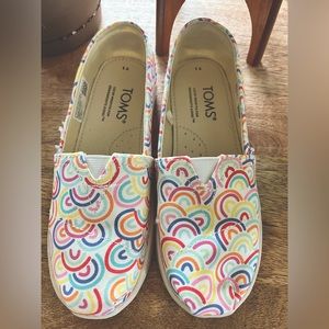 Brand new never worn kids’ rainbow Toms slip ons! So cute! NWT
